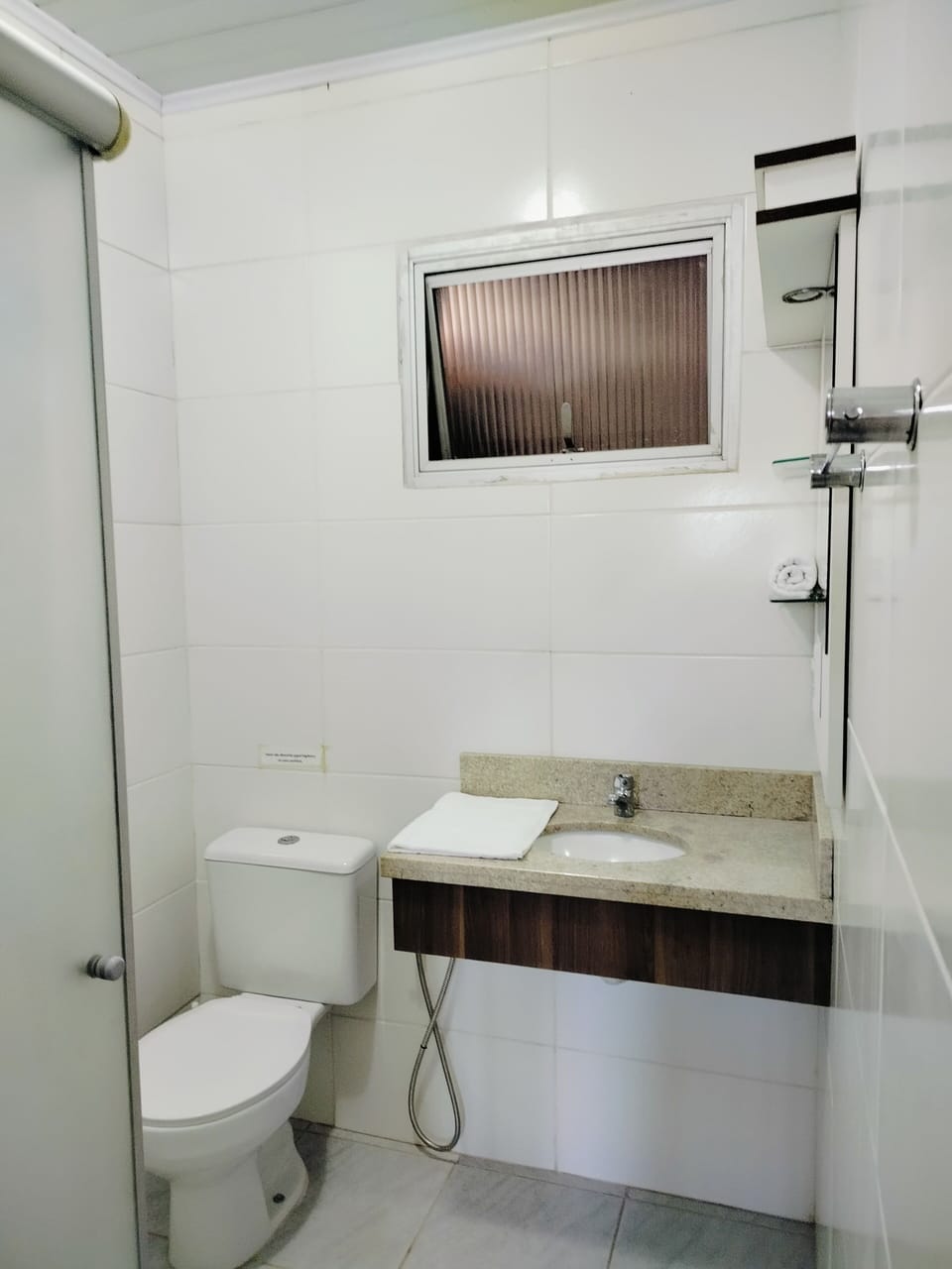 Shower, towels, soap, toilet paper