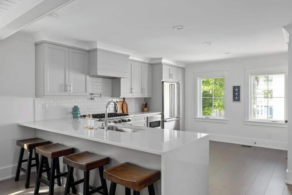 Waterfall countertop with bar seating for 4.  