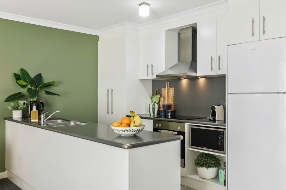 Fully equipped kitchen with full-size appliances for home-style cooking