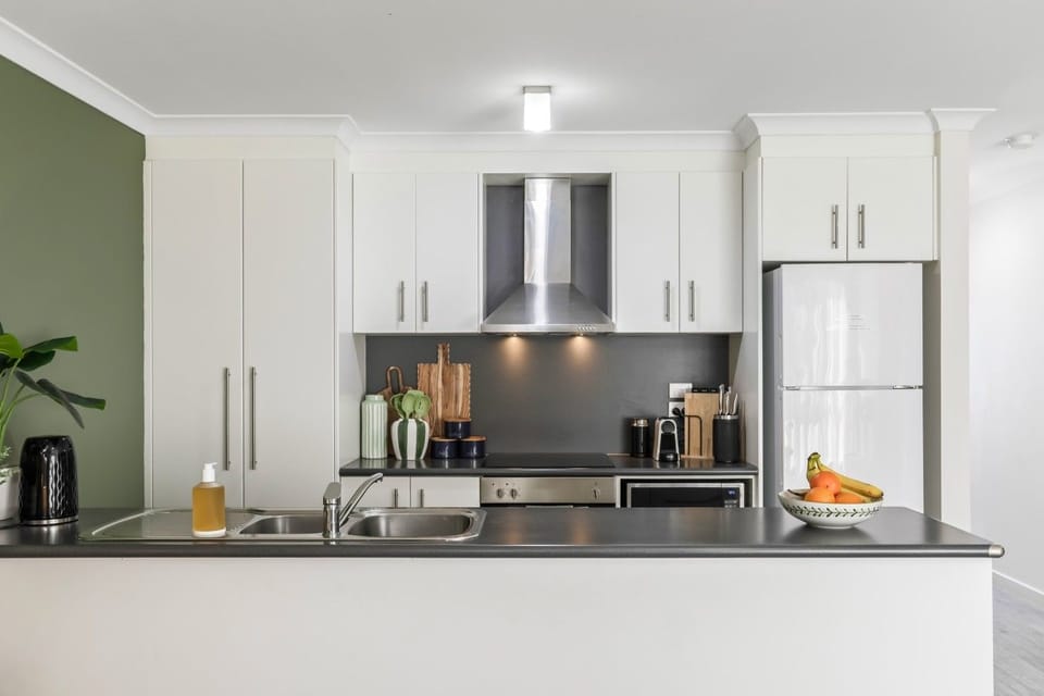 Well-appointed kitchen with ample cabinetry and quality appliances