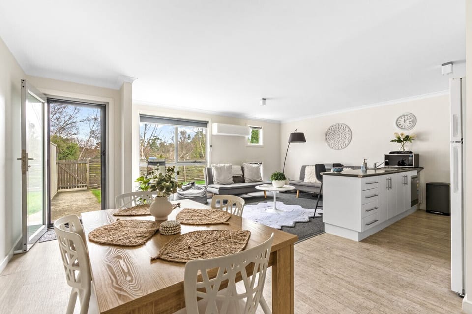 Open-plan living, dining and kitchen — light-filled and relaxed
