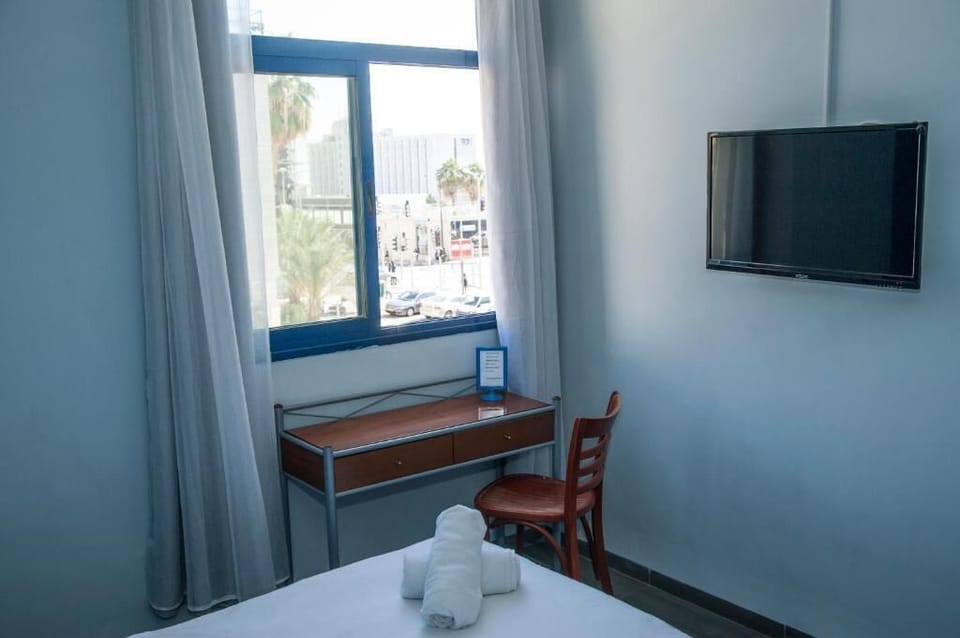 Desk, free WiFi, bed sheets