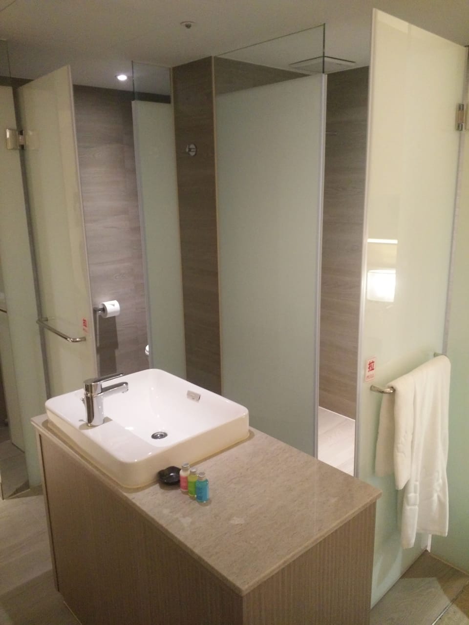 Eco-friendly toiletries, hair dryer, slippers, towels