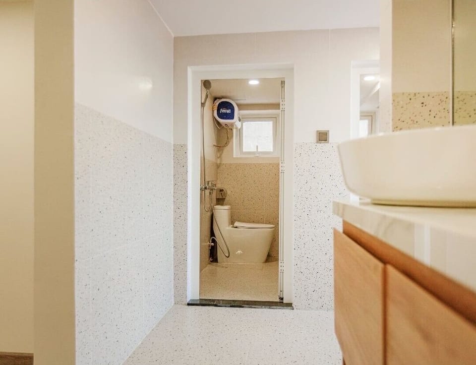 Standard Apartment, City View | Bathroom | Free toiletries, slippers, soap, shampoo