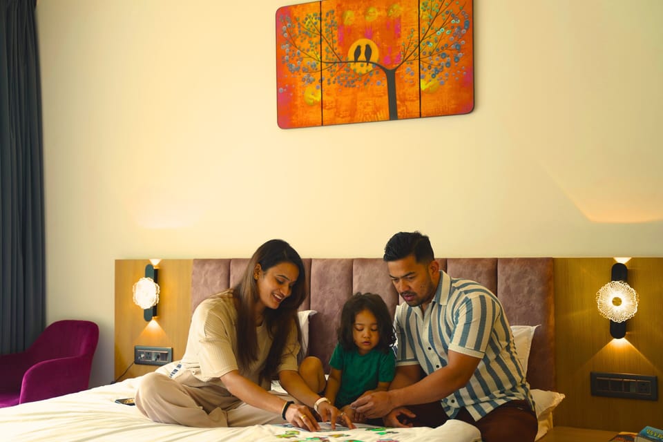 Double Deluxe Balcony Room | Desk, laptop workspace, blackout drapes, soundproofing