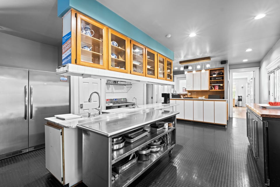 Well-appointed kitchen featuring modern appliances and generous storage.