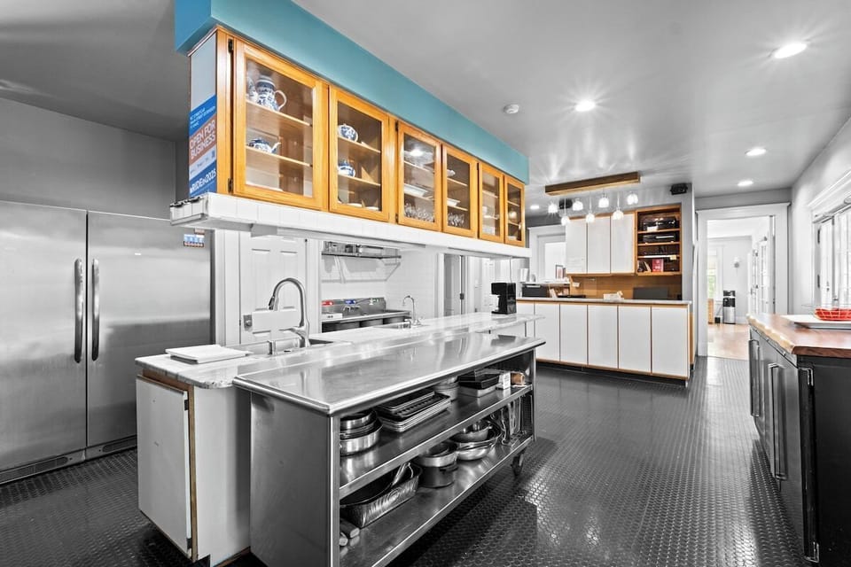 Well-appointed kitchen featuring modern appliances and generous storage.