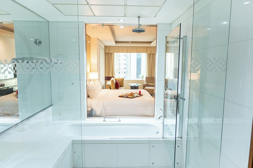 Grand Suite | Bathroom | Combined shower/tub, deep soaking tub, rainfall showerhead
