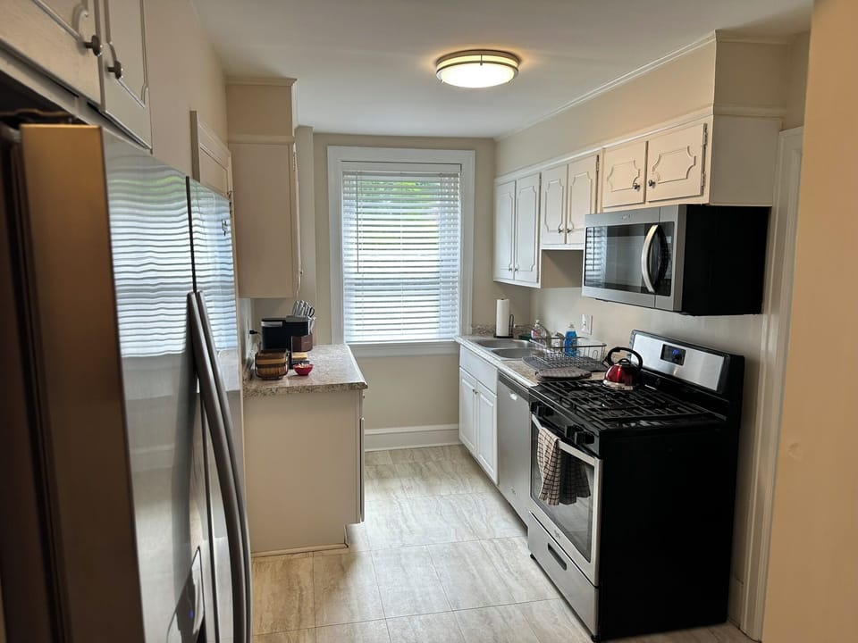The kitchen has all that your need for cooking, storing, and cleaning up.