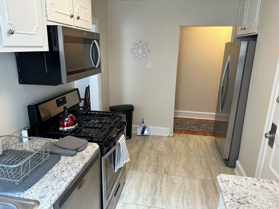 The kitchen has all that your need for cooking, storing, and cleaning up.
