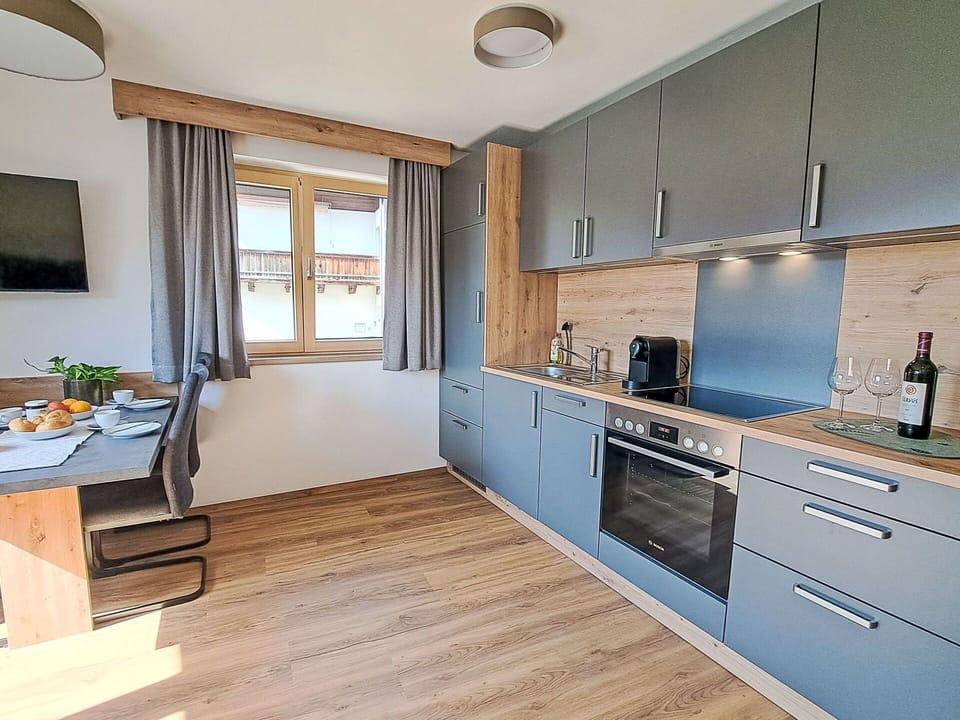 Wood, Furniture, Flooring, Countertop, Cabinetry, Interior Design, Kitchen, Floor, Major Appliance, Kitchen Appliance