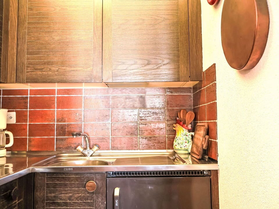 Kitchen, Countertop, Wood, Flooring, Kitchen Sink, Interior Design, Plumbing Fixture, Tap, Floor, Cabinetry