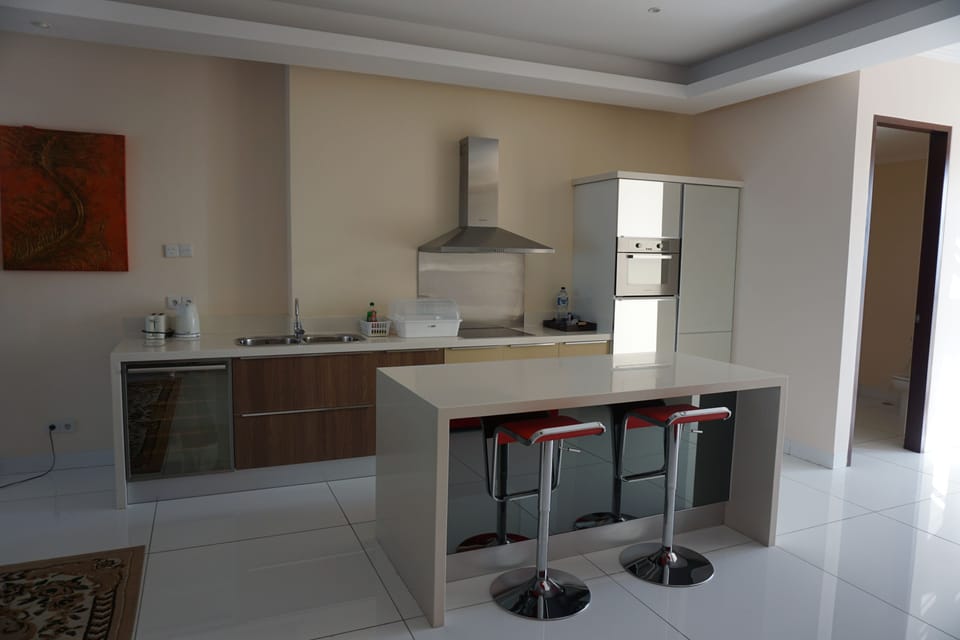 Penthouse, 3 Bedrooms | Private kitchen | Full-size fridge, microwave, stovetop, coffee/tea maker