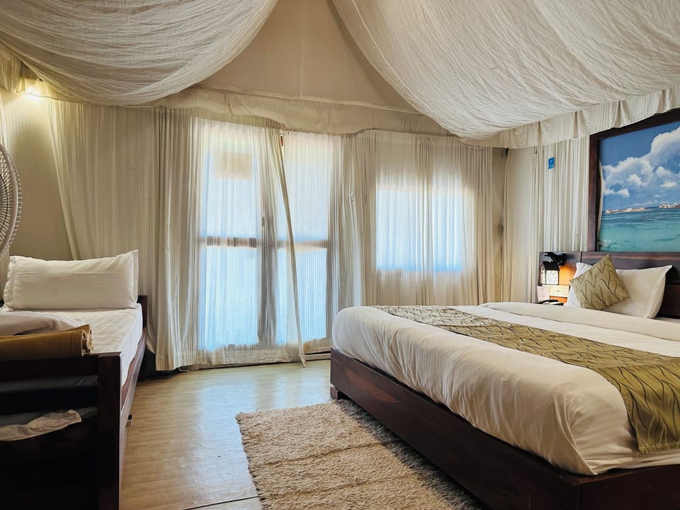 Luxury Tent, Balcony, Pool View | Desk, soundproofing, rollaway beds (surcharge), bed sheets