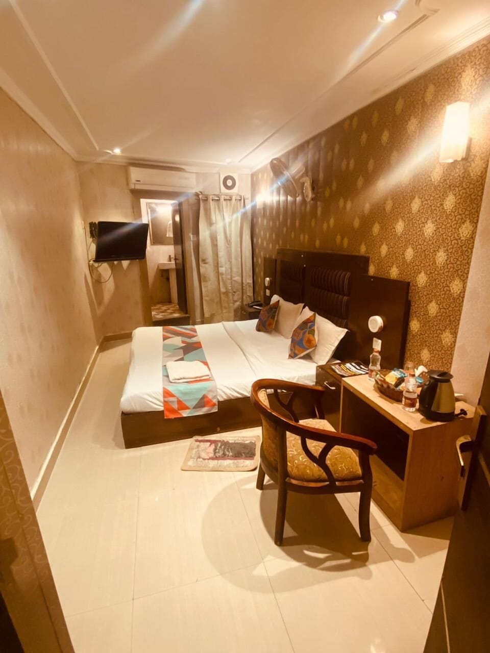 Classic Double Room, City View | Living area | TV
