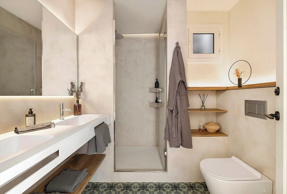 This spacious shared bathroom features a double sink.