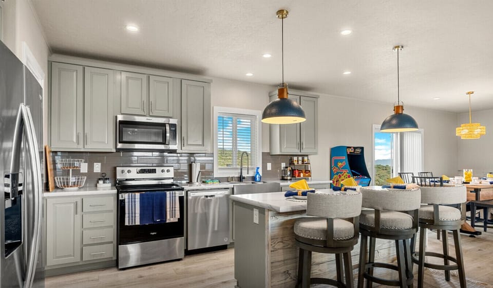 Modern kitchen with island seating, steps from Bear Lake