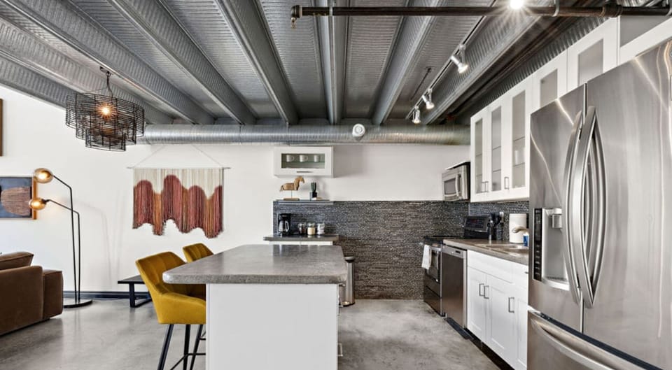 Feel right at home in our kitchen, fully equipped with a fridge, stove, pots, pans, and utensils.