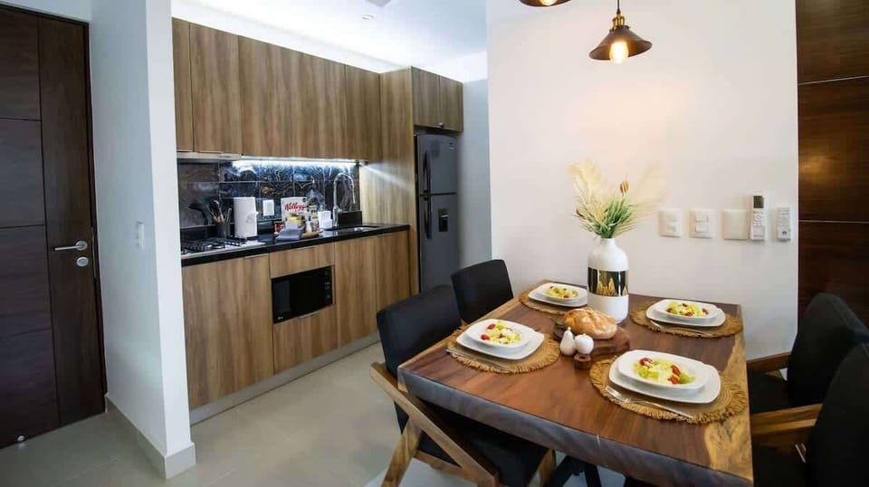 There's a gorgeous natural wood dining table where you can enjoy a sit-down meal