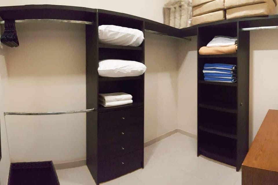 You'll find extra pillows, towels, and blankets in the closet