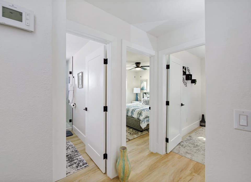Upstairs Hall view of bathroom and bedrooms