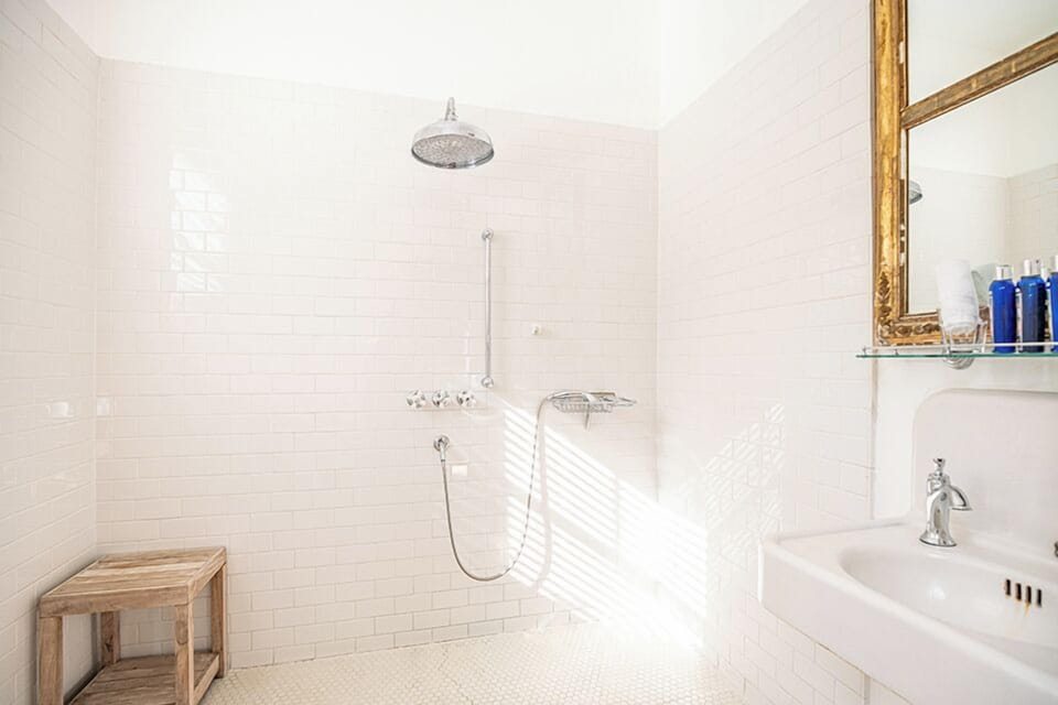 Standard Room, 2 Queen Beds | Bathroom | Combined shower/tub, rainfall showerhead, free toiletries, hair dryer