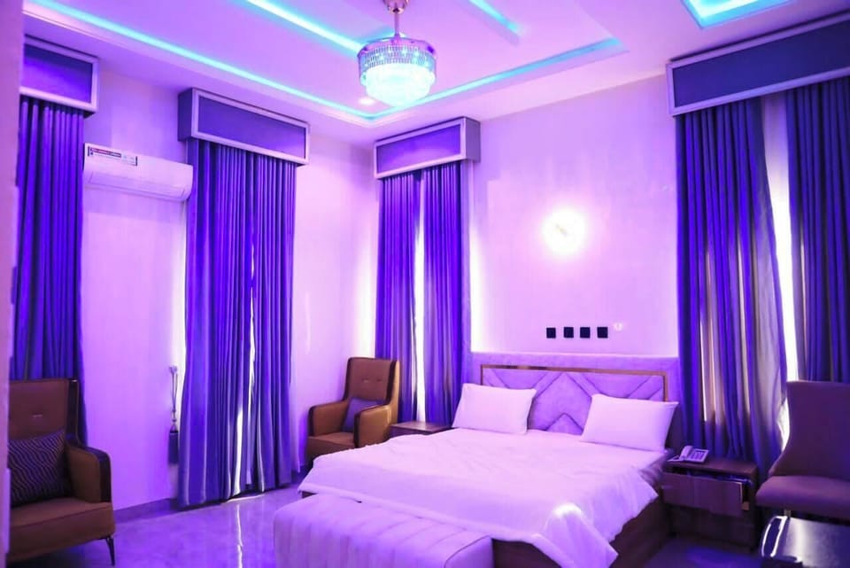 Deluxe Room, Balcony, City View | Desk, laptop workspace, blackout drapes, soundproofing