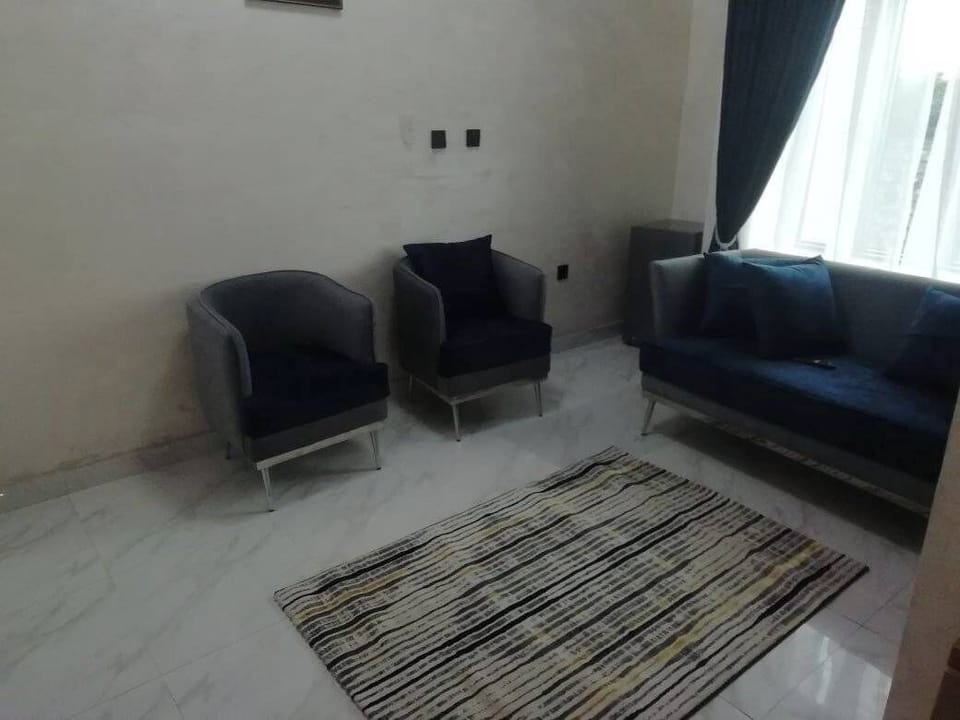 Deluxe Room, Balcony, City View | Living area