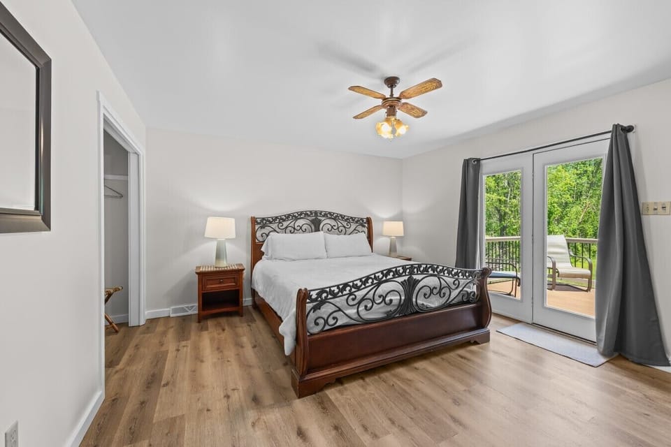 Master bedroom with king bed, main floor