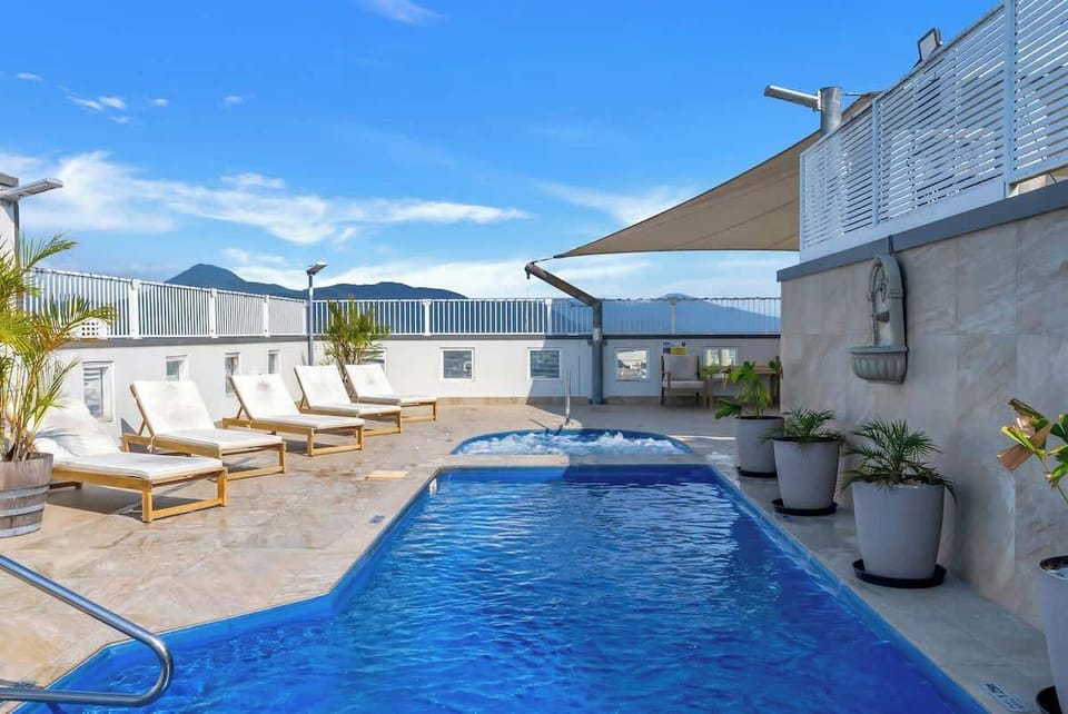 Soak up the sunshine and skyline from the rooftop pool—an inviting escape above the city.