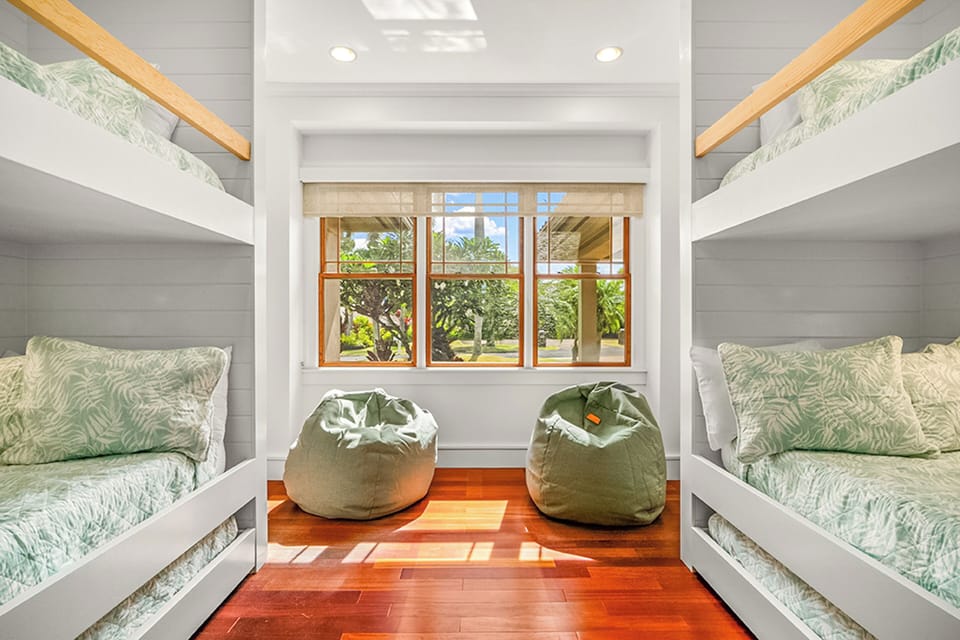 Bedroom 5: Features 2 built-in bunk beds, each with a 3rd, bottom pull-out trundle bed, plus A/C to keep the whole crew cool and comfortable after beach adventures (Bedroom 5). Total bed count is 6 twin beds.
