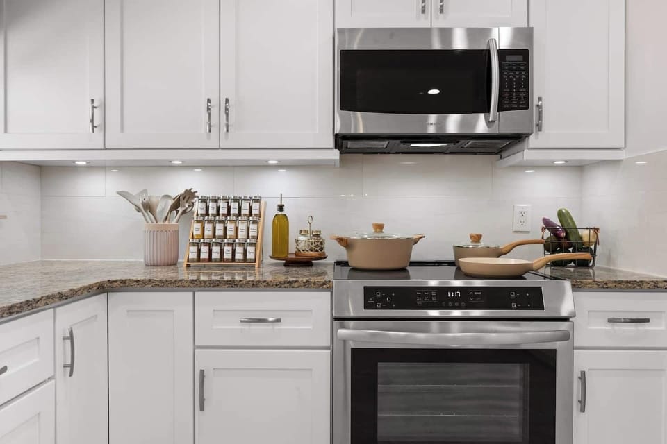 Family dinner in? We’ve got you! The kitchen is stocked with brand-new appliances, an induction cooktop, pots, pans, spices, olive oil, baking sheets, casserole dishes & more — perfect for whipping up a relaxed family dinner after a sun-soaked day.