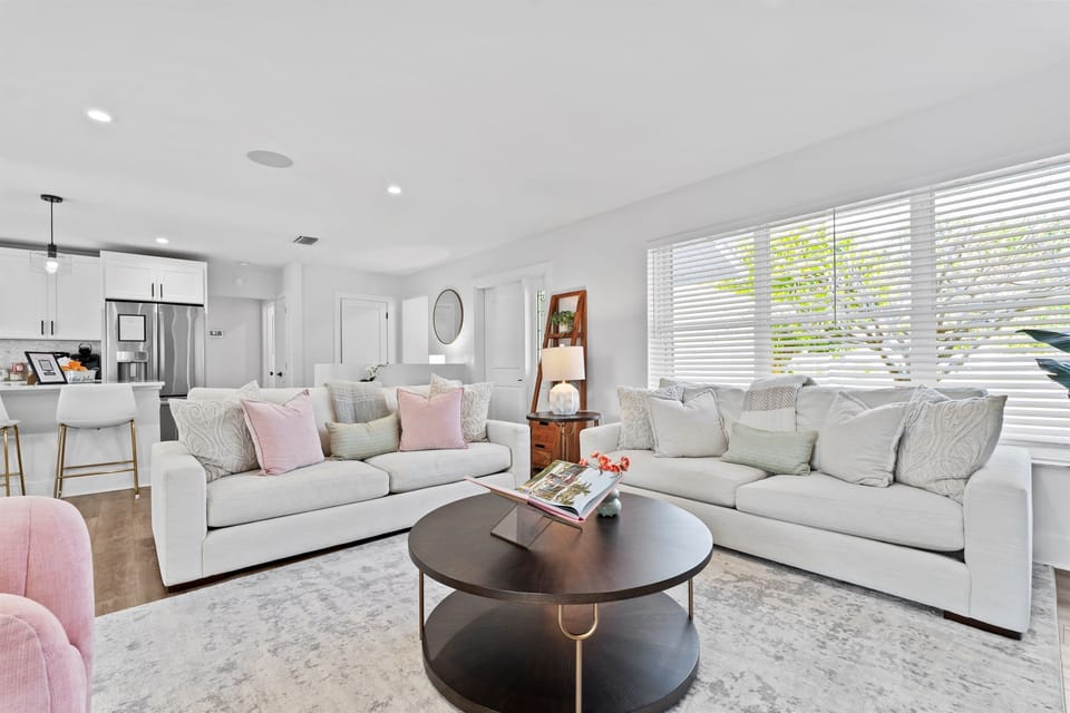 The open-concept layout creates the perfect flow for entertaining, relaxing, and spending quality time with family and friends in effortless comfort.