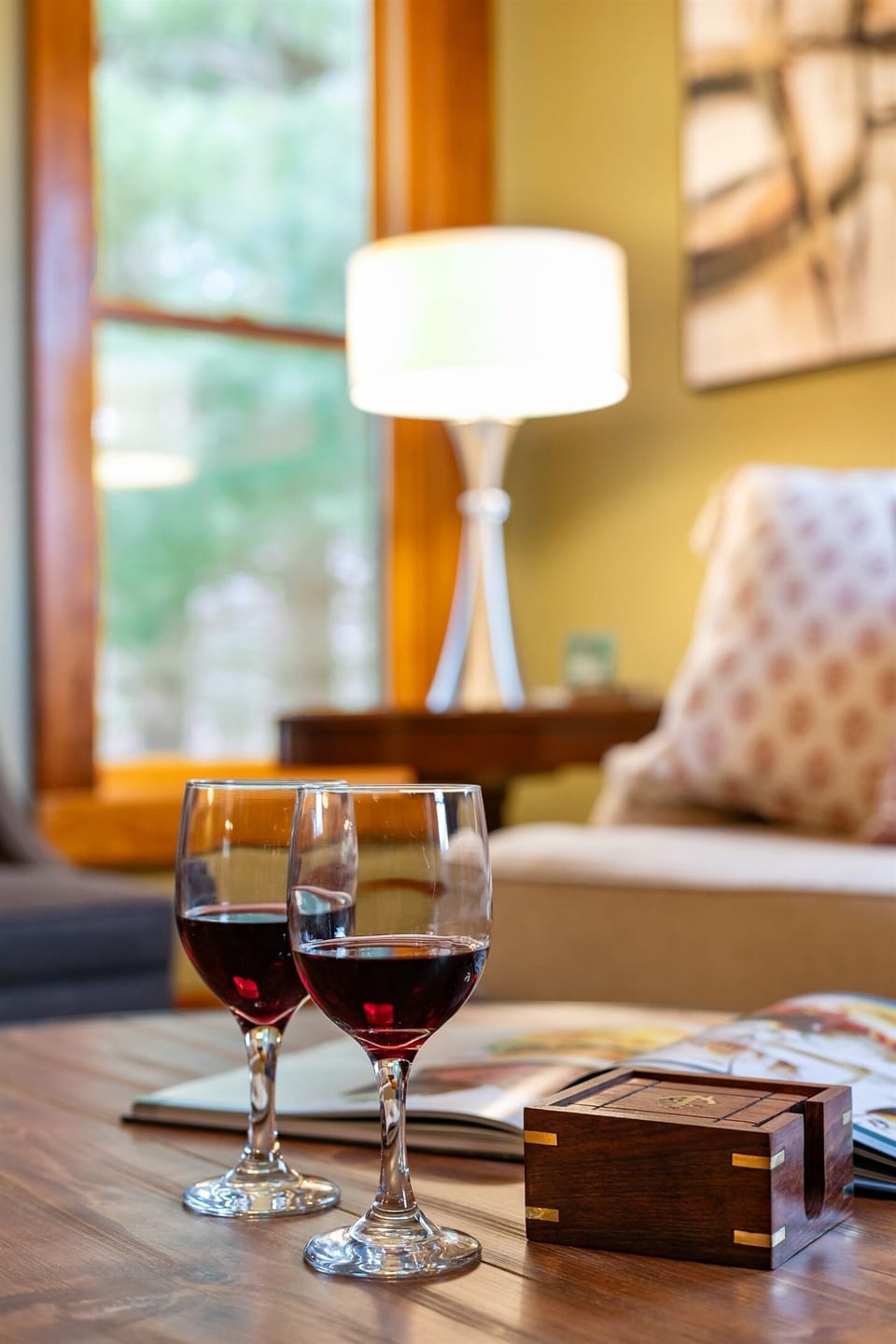 Pour a glass, sink into the couch, and let the evening slow down in the cozy living room