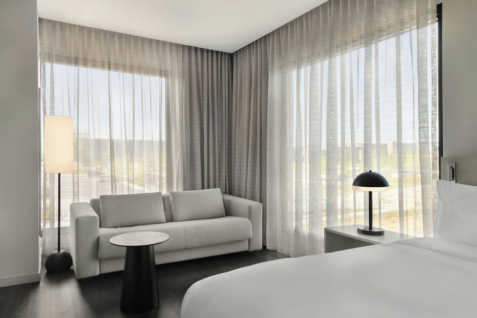 Deluxe Room, 1 King Bed with Sofa bed | In-room safe, blackout drapes, iron/ironing board, travel crib
