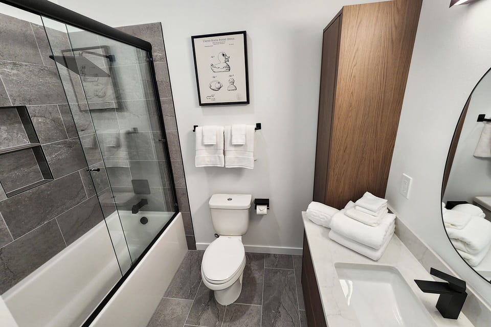Full bath to share on the third floor.
