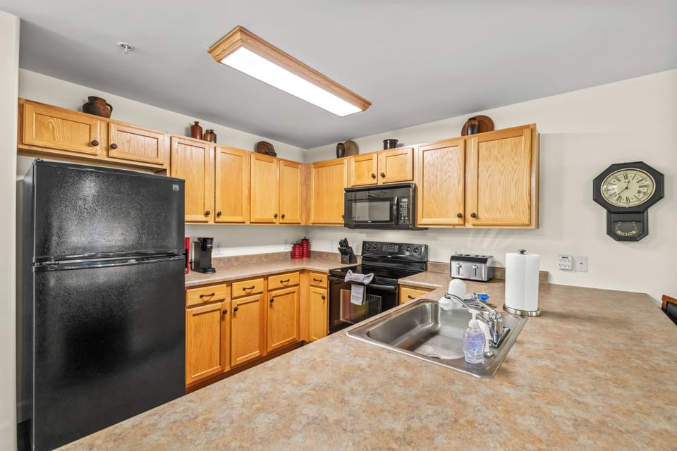 Spacious kitchen with large counter space.