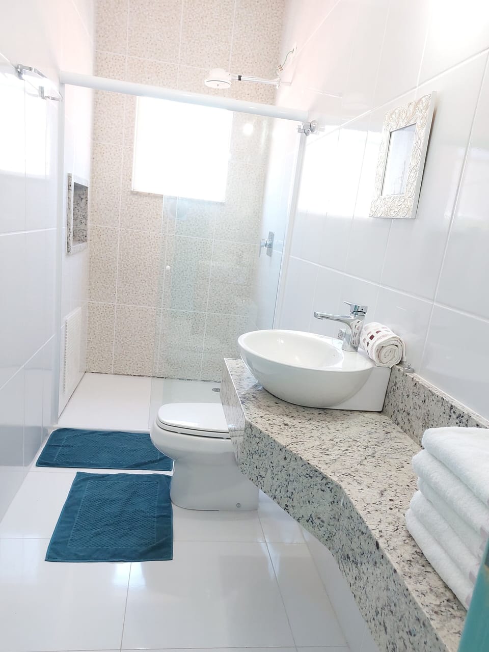 Quadruple Room | Bathroom | Shower, towels, soap, toilet paper