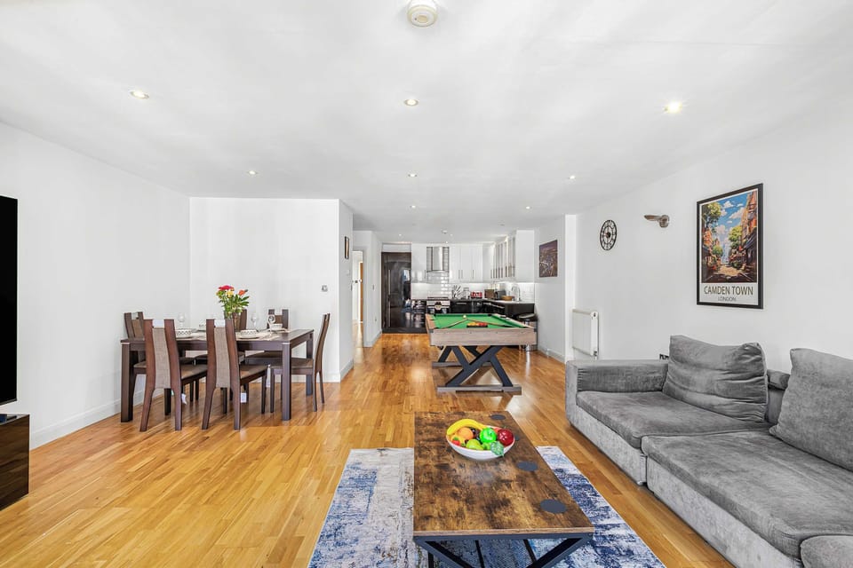 Bathed in natural light, this beautifully designed living room offers a bright, airy and inviting space to relax, recharge and feel right at home