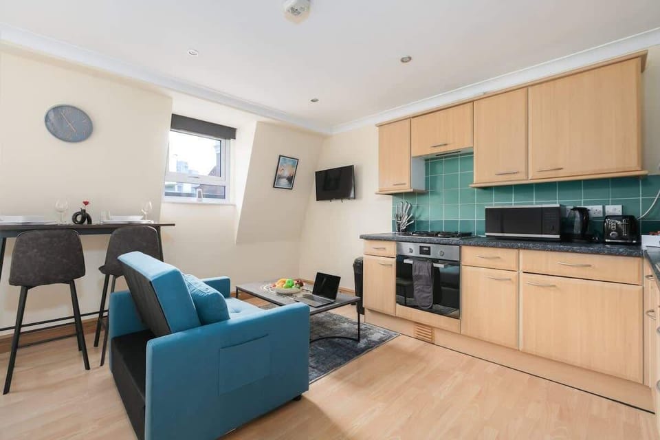 Kitchenette with living area and TV 