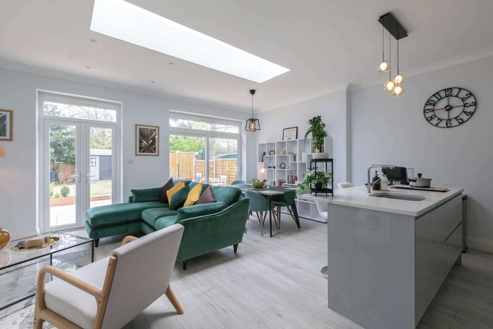 A spacious open-plan living area featuring elegant interiors and thoughtful décor, creating a welcoming space to gather and unwind