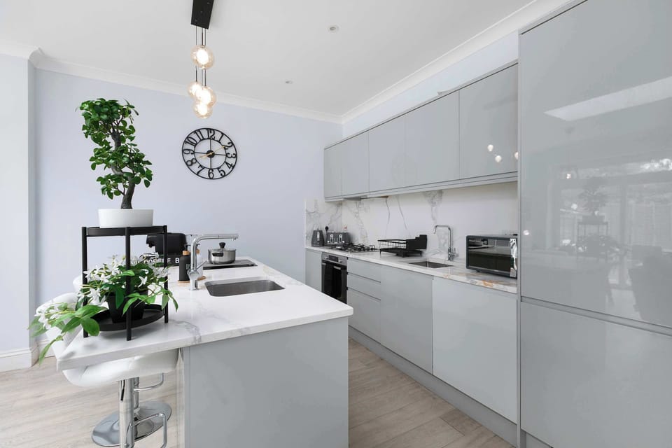 A beautifully designed kitchen island with comfortable seating creates the perfect social hub for breakfast, coffee, evening drinks and memorable moments together