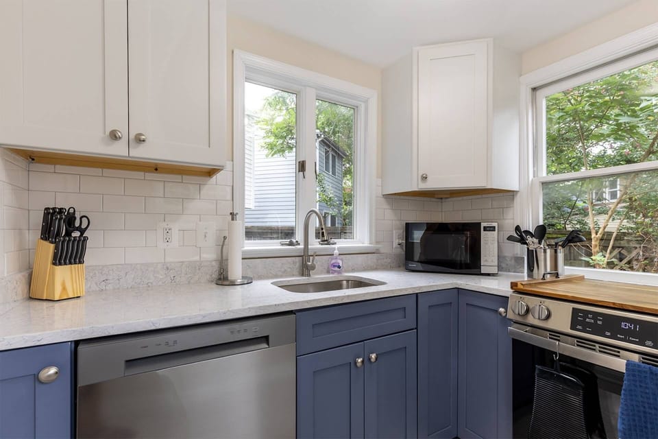 At the back of the home is the bright full kitchen, with all new finishes and appliances.