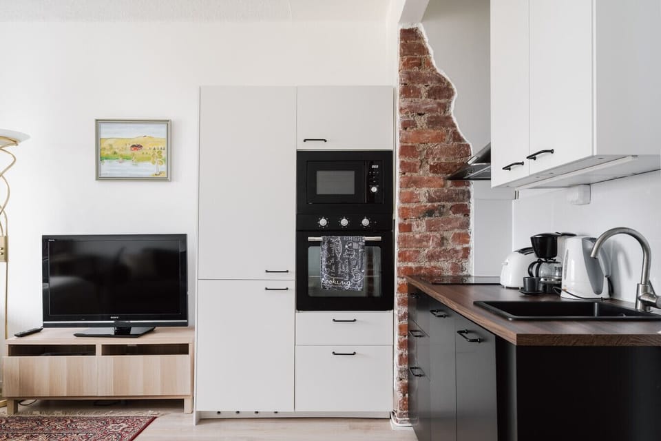 Bright, functional, and beautifully designed—whether you`re making coffee or dinner, this kitchen has you covered.