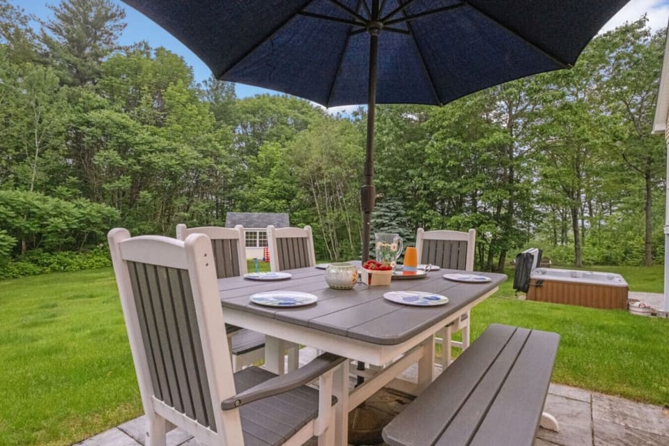 Large outdoor dining space adjacent to the grill—perfect for barbecues, gatherings, and enjoying fresh air.