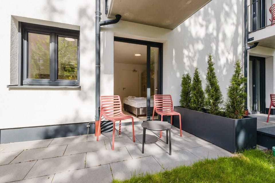 Private terrace area with cozy seating.