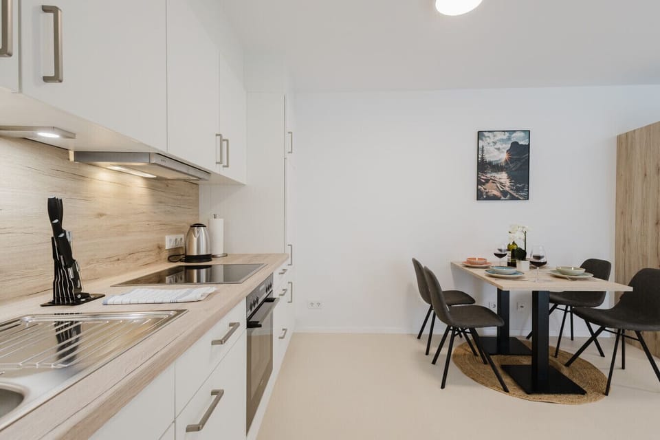Beautiful kitchen with a dining area for four people.