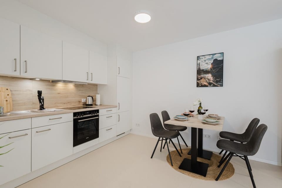 Compact, fully equipped kitchen with modern appliances.
