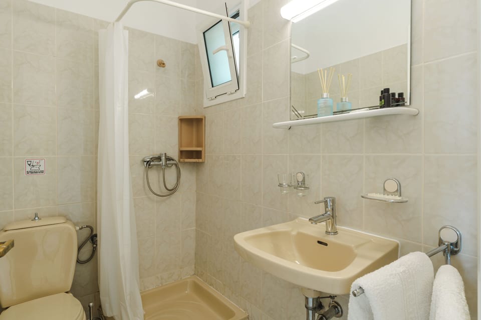 Comfort Room, Balcony, Sea View | Bathroom | Shower, hair dryer, towels, soap