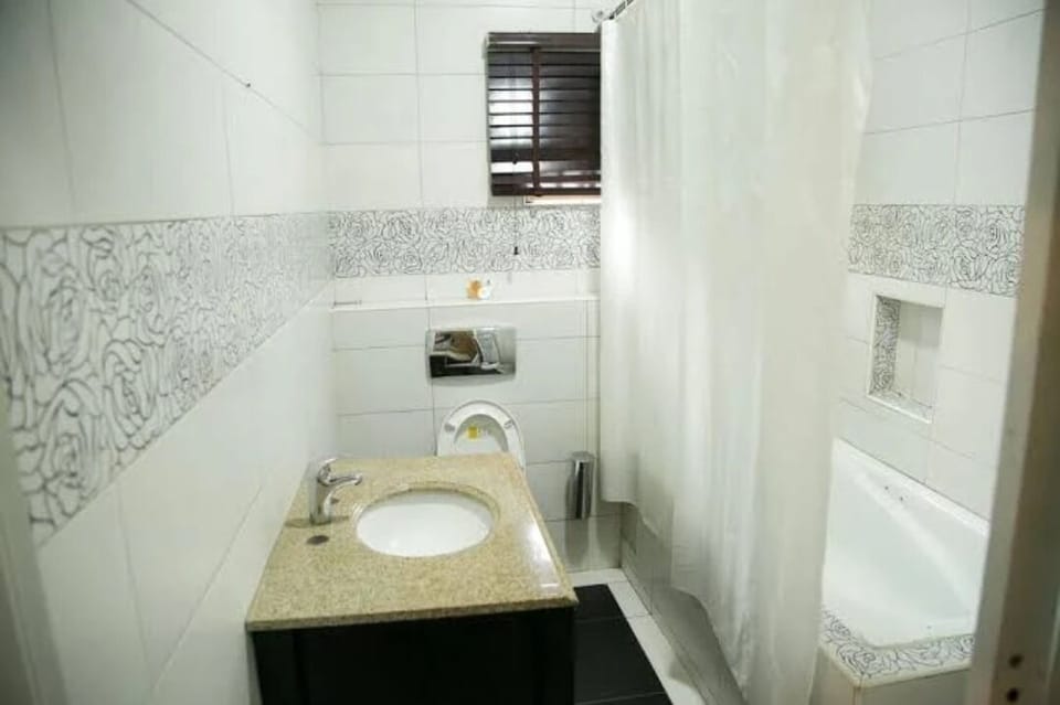 Apartment, 2 Bedrooms | Bathroom | Separate tub and shower, soap, toilet paper